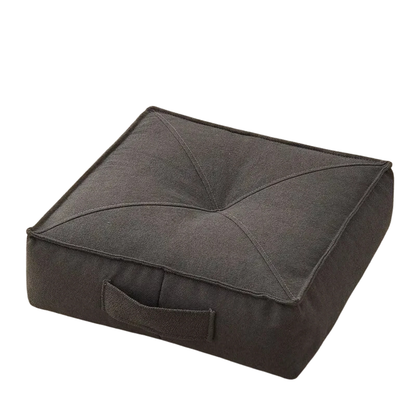 Gray cushion with a handle on a white background